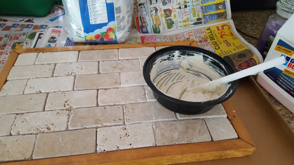Mix grout to icing-like texture