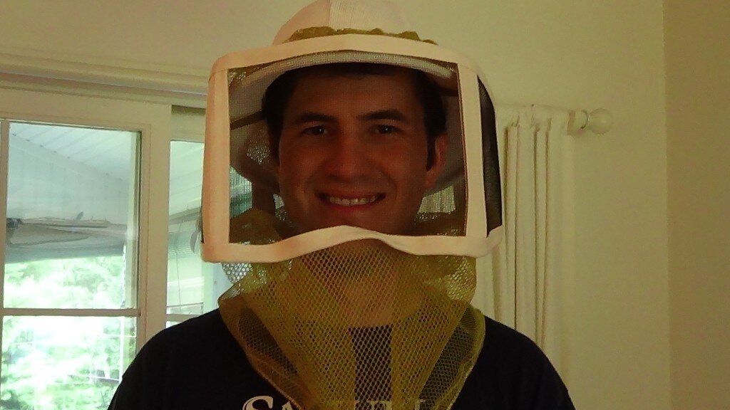 Here is my husband with his new veil from NEBees! No more bees flying in HIS face. 
