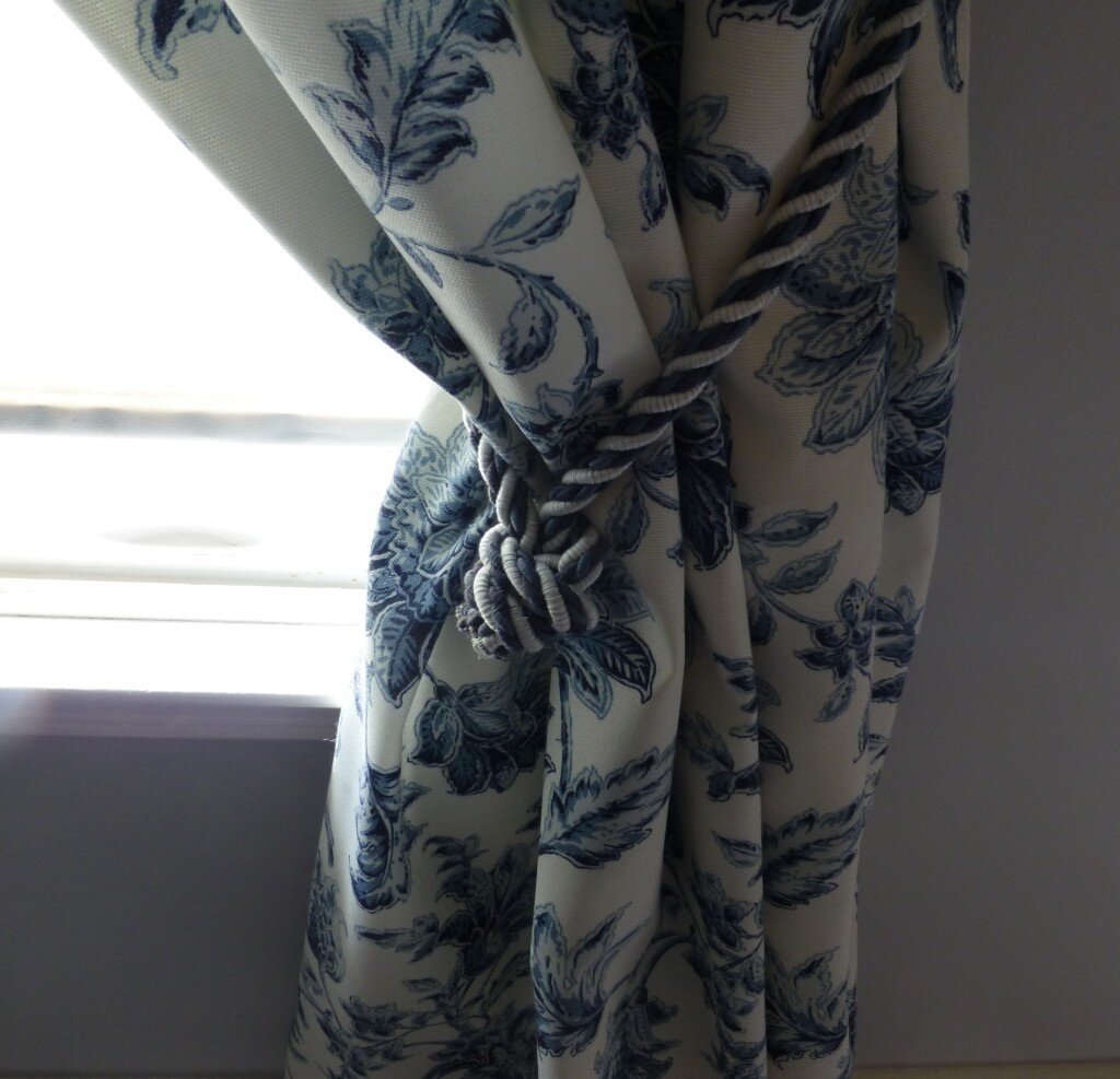 Simple tie backs using an overhand knot.