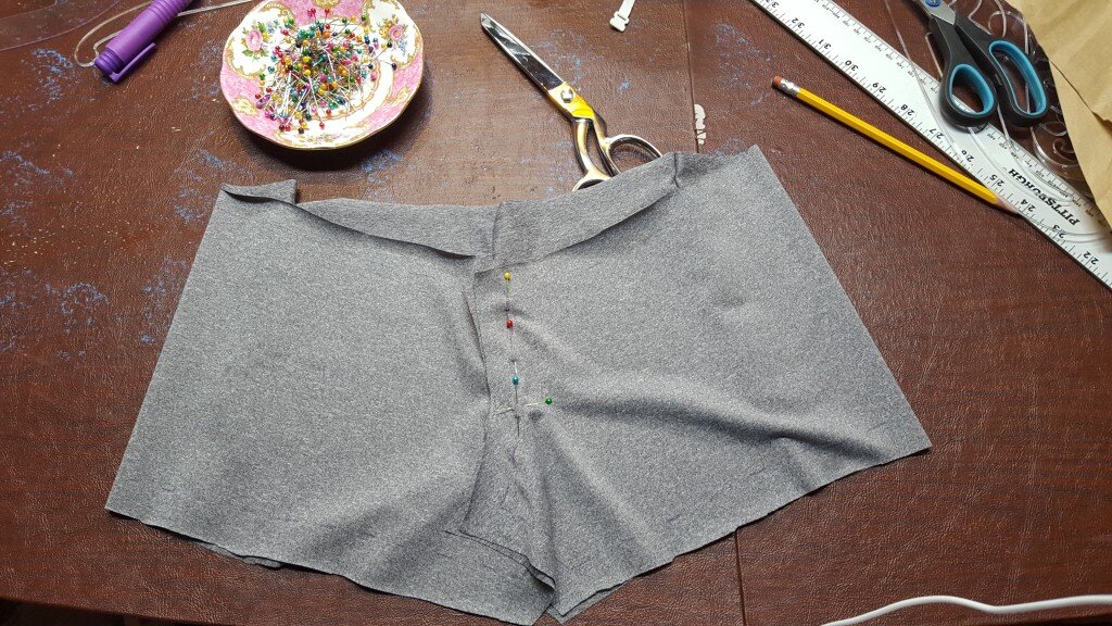 Pin front sections together on center front up to marking on pattern