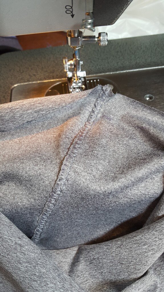 Stitch over trimmed seam allowance.