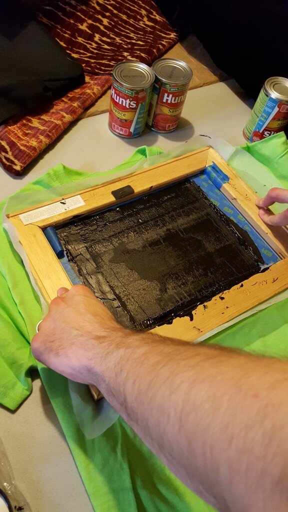 Will held down the screen as I used the squeegee. This is post squeegee. (Notice the discarded soup cans that were attempting to hold the screen in place.)