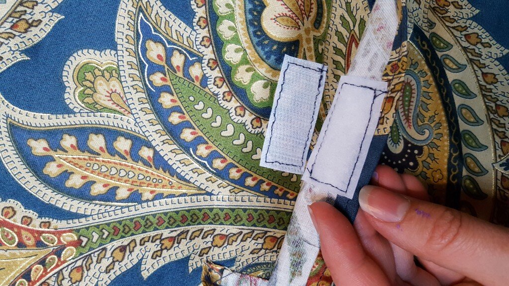 Attach velcro to inside of pocket. 