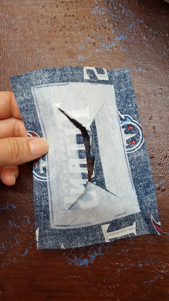 Cut "v"s into fabric