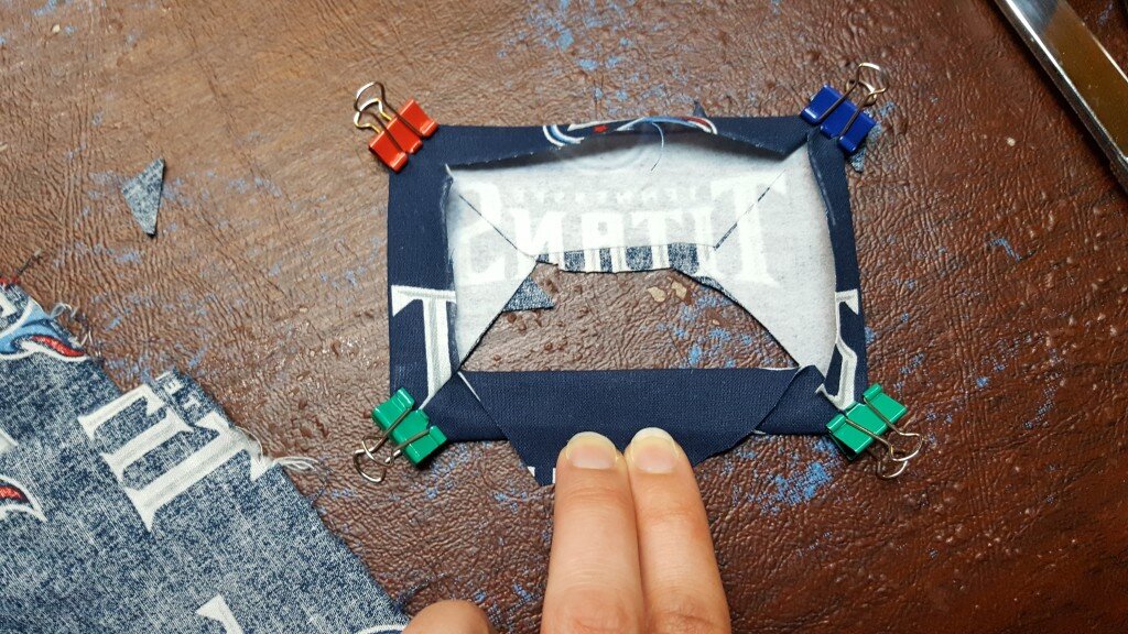 Fold inner pieces out, forming a frame.