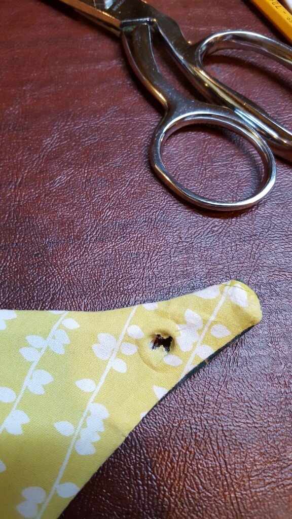 Cut out hole for eyelet