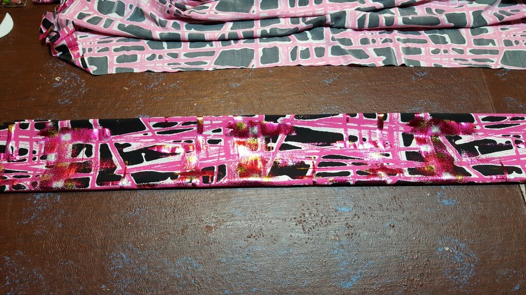 Fold in half again lengthwise