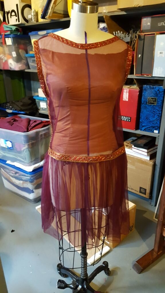 Trim hemline to where you want dress to fall. 