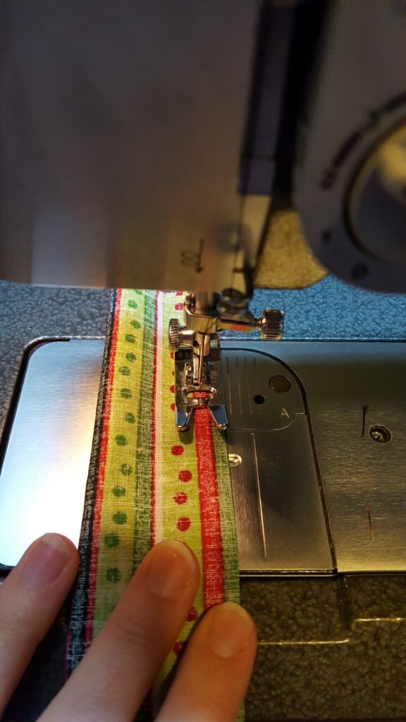 Fold bow center in half and stitch. 