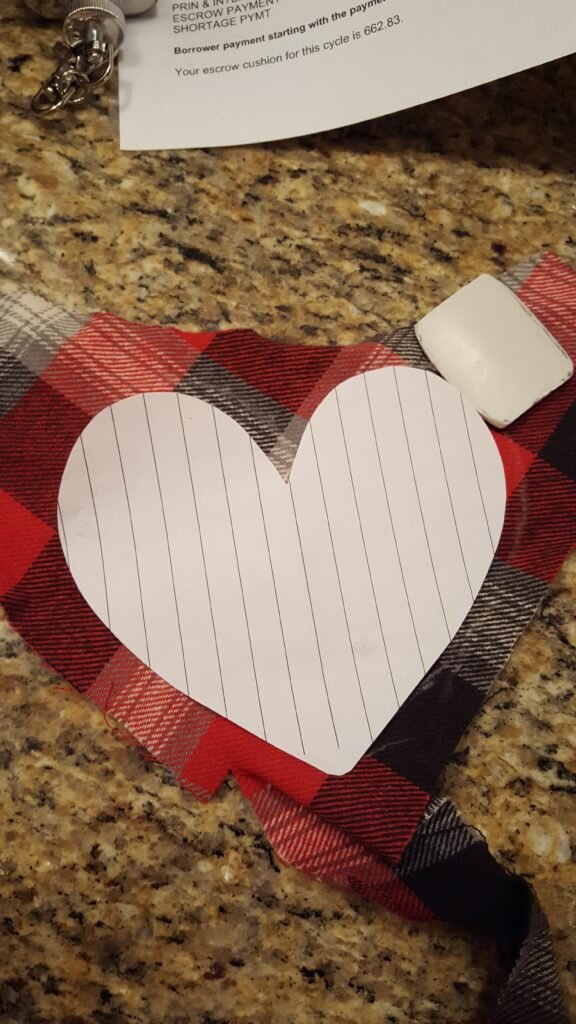 Trace heart pattern onto flannel.