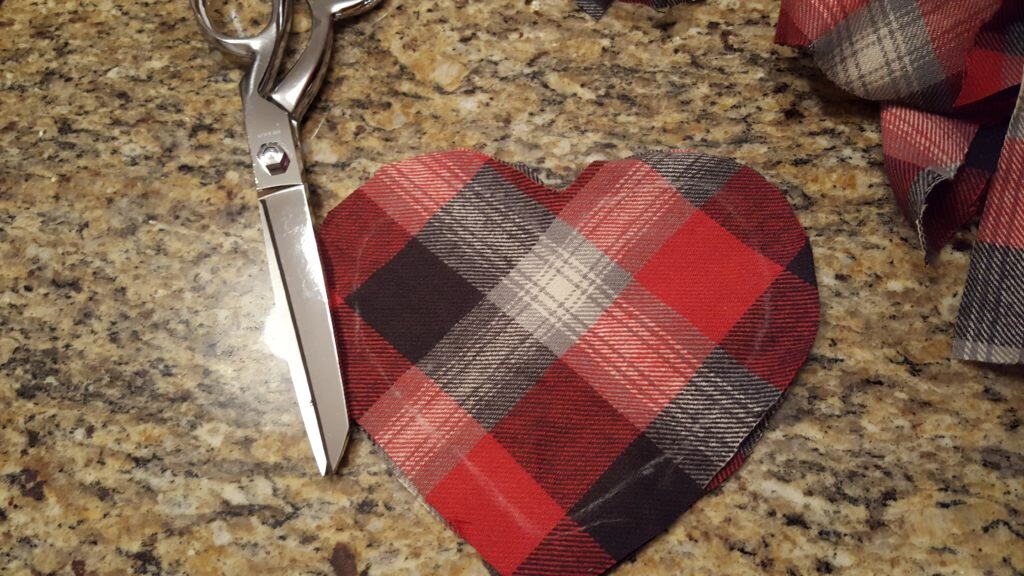 Cut around heart leave 1/2" seam allowance.