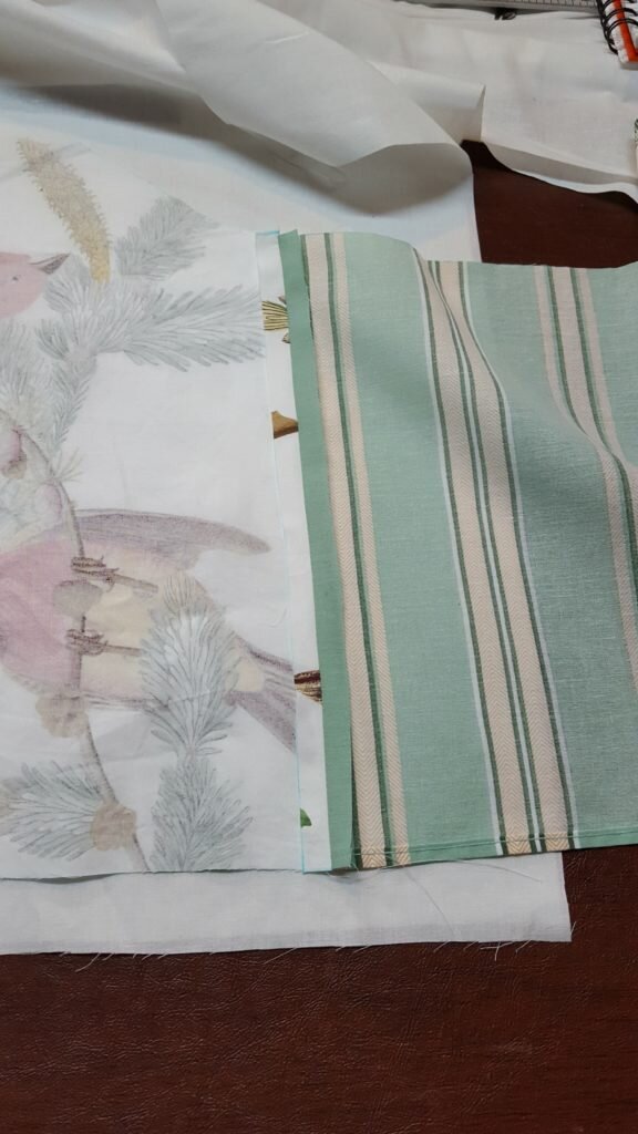 Pin pleats to scallops and stitch. 