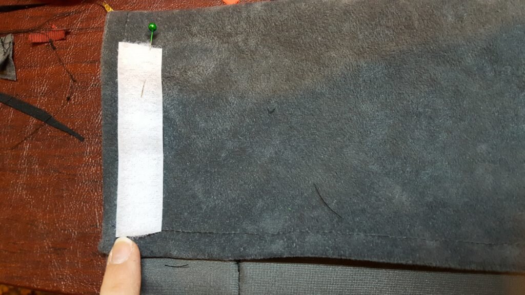 Attach other side of velcro to opposite side, outside carrier. 