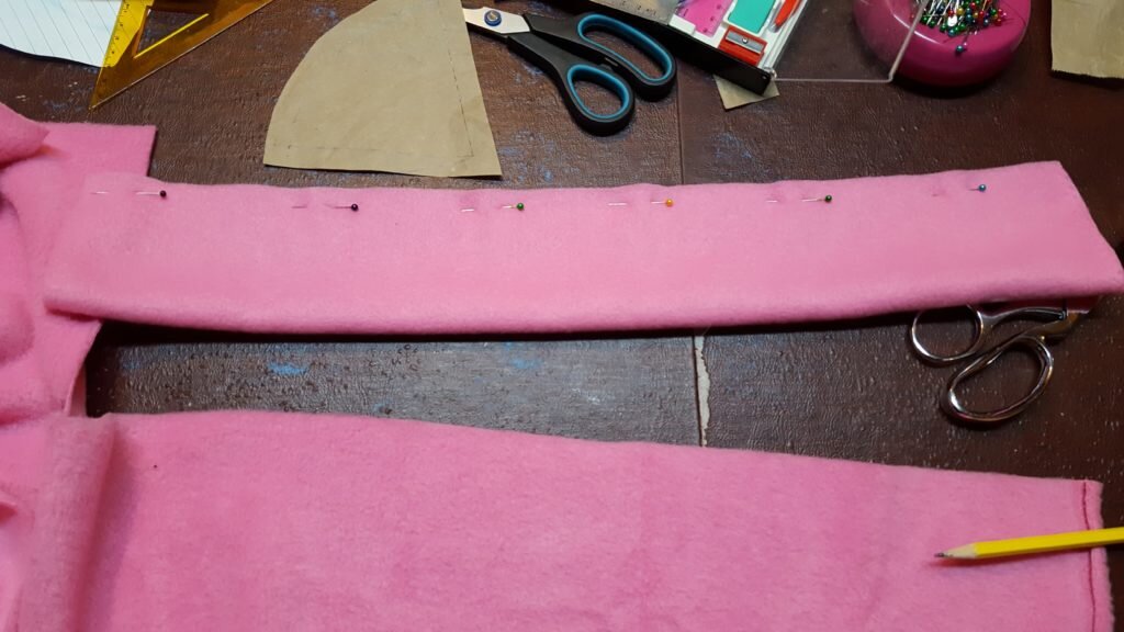 Fold band in half and pin. 