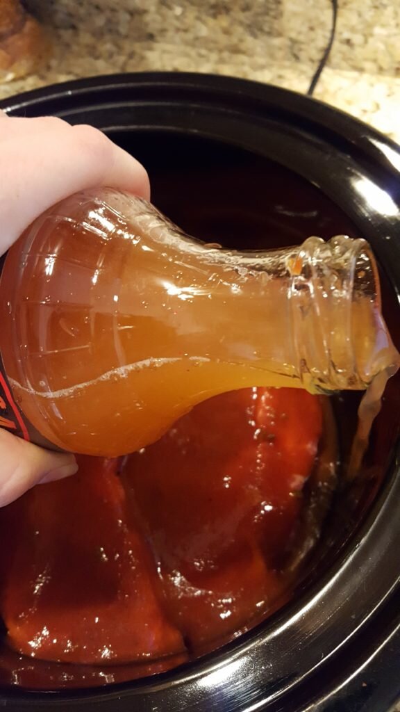 Pour a bottle of water around the meat. 